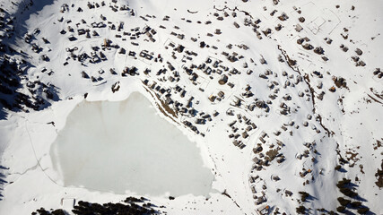 Aerial View of the frozen  Prokosko lake and the surrounding village during winter. One of the most...