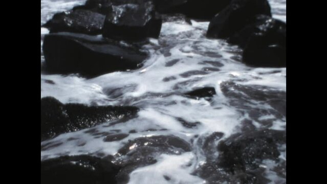 Rocky Surf 1967 - Waves wash up on a rocky shore in southern California in 1967.