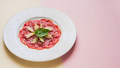 Carpaccio with coloured background and minimalist style, copy space