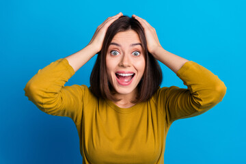 Photo of shocked funky lady dressed shirt open mouth arms head smiling isolated blue color...