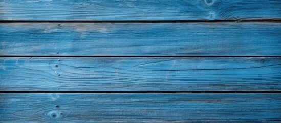 Obraz premium Blue wooden wall close-up with detailed surface