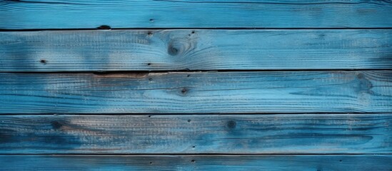 Fototapeta premium Close up of a hole in a blue wooden wall