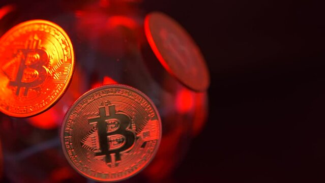 Flickering of an electric sphere covered with collectible Bitcoin coins symbolizes primacy of the world cryptocurrency BTC Bit coin rotating on dark background.