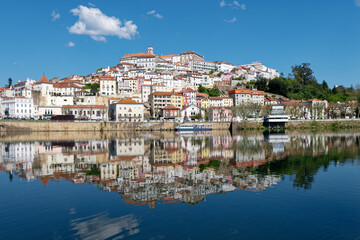 Fototapeta na wymiar Coimbra, a riverfront city in central Portugal is home to a preserved medieval old town and the historic University of Coimbra. Unesco world heritage site.