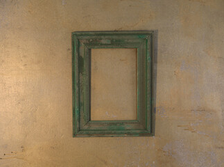 wooden rustic dusty frame on concrete wall