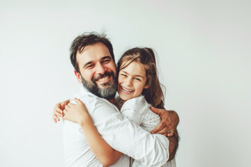 Fototapeta premium Dad holding his little daughter at home, smiling and have fun. Happy Father's Day