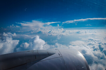 The plane window is the symbol of a trip.