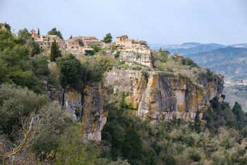 Fototapeta na wymiar Streets and squares of Siurana, with its rock houses on top of a hill, tourist village of Tarragona, Spain.