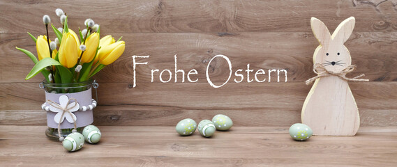 Grußkarte Frohe Ostern:  Ostereier und ein Dekohase mit Ostergruß .