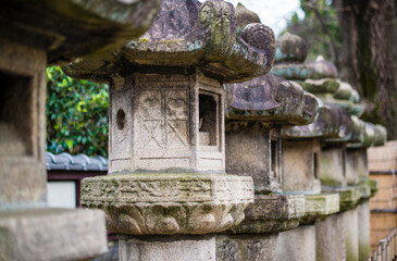 Fototapeta premium Nara, Japan - March 27 2017: Stone lantern toro in Nara park