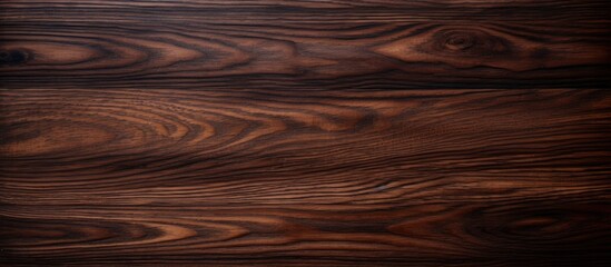 Obraz premium An extreme close-up image of a wooden surface with a dark brown stain