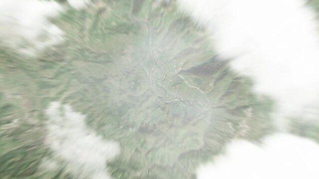Earth zoom in from space to Zenica, Bosnia and Herzegovina. Followed by zoom out through clouds and atmosphere into space. Satellite view. Travel intro. Images from NASA