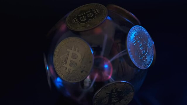 Abstract earth globe with bitcoin cryptocurrency coins rotating on dark blue background, social media video, news posts. Stock market. Virtual blockchain.