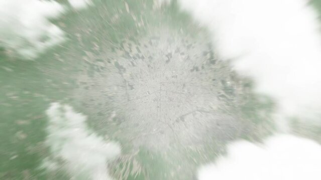Earth zoom in from space to Margilan, Uzbekistan. Followed by zoom out through clouds and atmosphere into space. Satellite view. Travel intro. Images from NASA