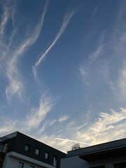 blue sky with traces of aircraft - obrazy, fototapety, plakaty