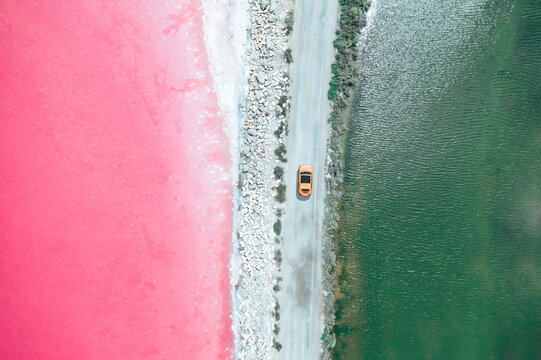 Aerial view on pink water Saline Aigues Mortes, Camargue France