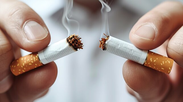 Quitting smoking - finger hand crushing cigarette, anti smoke program.