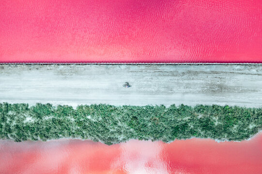 Aerial view on pink water Saline Aigues Mortes, Camargue France