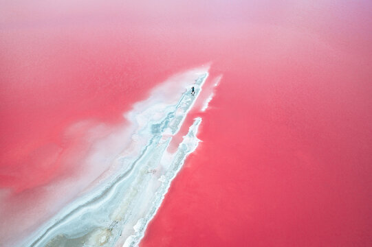 Aerial view on pink water Saline Aigues Mortes, Camargue France