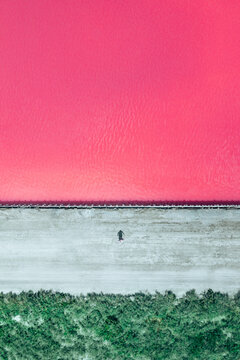 Aerial view on pink water Saline Aigues Mortes, Camargue France