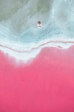 Aerial view on pink water Saline Aigues Mortes, Camargue France