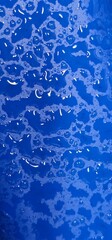 texture of water drops on blue background. abstractionism