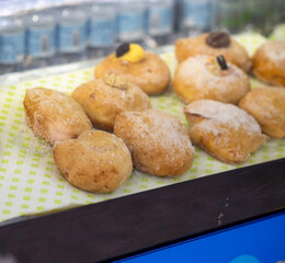 typical neapolitan pastry called zeppola di san giuseppe at market