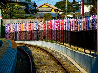 Kyoto, Japan - March 25 2016: Colorful Lamp posts decoration on railway platform of Kyoto