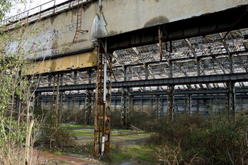 The crystal palace in Milan Lambrate, factory for the assembly line of motorcycles, abandoned, damage assessment to the structures of the former industrial plants