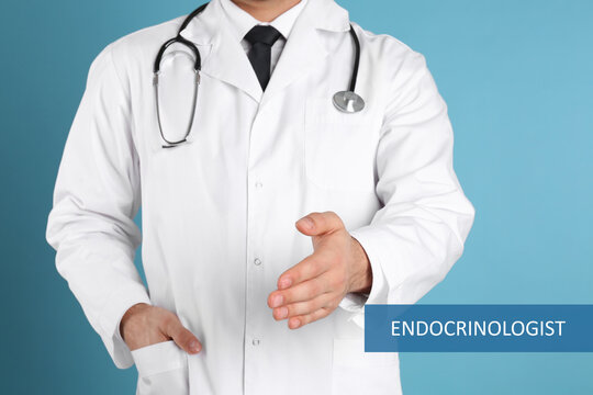 Endocrinologist offering handshake on light blue background, closeup