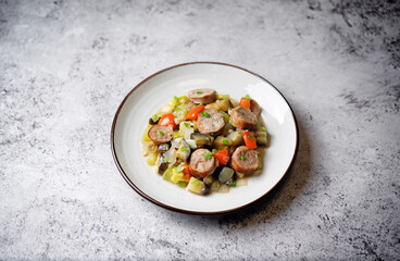 Italian sausages with prepared vegetables