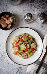 Italian sausages with prepared vegetables