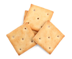 Tasty crispy square crackers isolated on white, top view