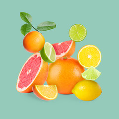 Stack of different citrus fruits on light blue background