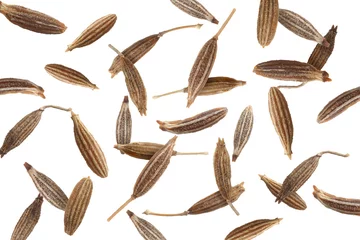 Fotobehang Many cumin seeds falling on white background © New Africa