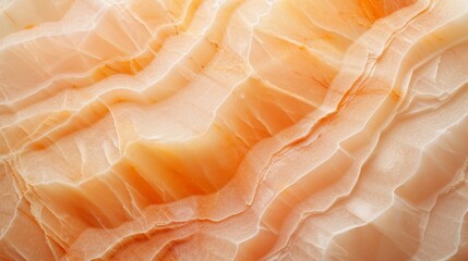 Abstract peach background. Marble structure. A close-up view of intricate, wavy layers of orange...