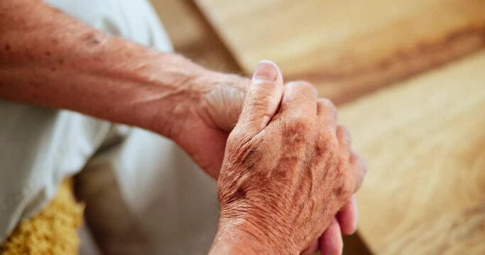 Anxiety, above or senior hands with stress, fear or anxiety, worry or overthinking news, results or outcome. Zoom, fingers and nervous old person in a nursing home waiting for feedback or diagnosis