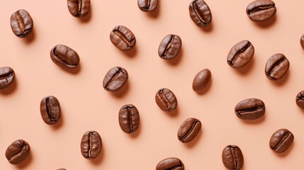 Roasted coffee beans in geometry location on peach background. Coffee beans in rich brown hues scattered on a soft peach background, creating an elegant pattern with varying orientations. Warm and