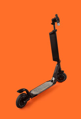 Black modern electric kick scooter on orange background