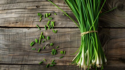 a bunch of fresh chives on a wooden table
 - Powered by Adobe