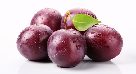 a group of plums with water drops on them