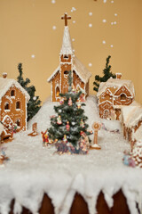 Christmas card. Assorted Christmas gingerbread cookies. Christmas gingerbread village, house, train, tree. Christmas New Year's background with snowflakes. gingerbread house, 