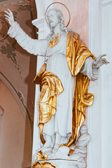 Obraz premium Kloster Ochsenhausen - Heiligenfigur in weiss und gold