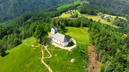 Aerial View of Sveti Jakob Hill with a Church on Top. Slovenia, Europe - 764365743