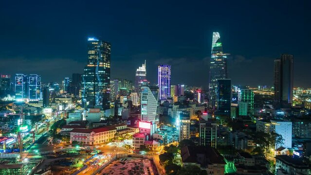 Timelapse view of Ho Chi Minh City (Saigon), Vietnam, showing landmark buildings and traffic in the financial district at night.