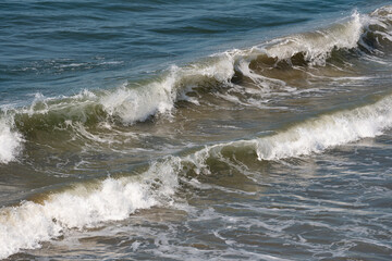 Beautiful crashing ocean waves with sea foam background - 764376307