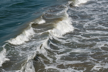 Beautiful crashing ocean waves with sea foam background - 764376309