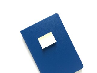 Blue notebook with sticker isolated on white
