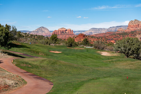 Panoramic view of Sedona, Ariozna and golf course par 3 hole in desert landscape 