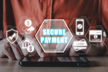 Fototapeta premium Secure payment concept, Man using smart phone on desk with secure payment icon on virtual screen.